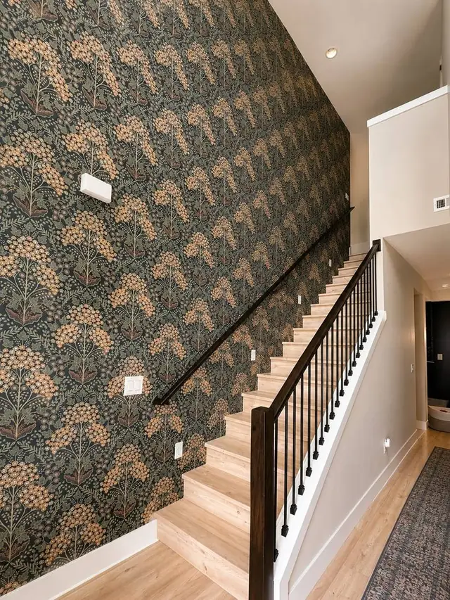 Dark floral William Morris-style wallpaper on a stairwell accent wall, Portland