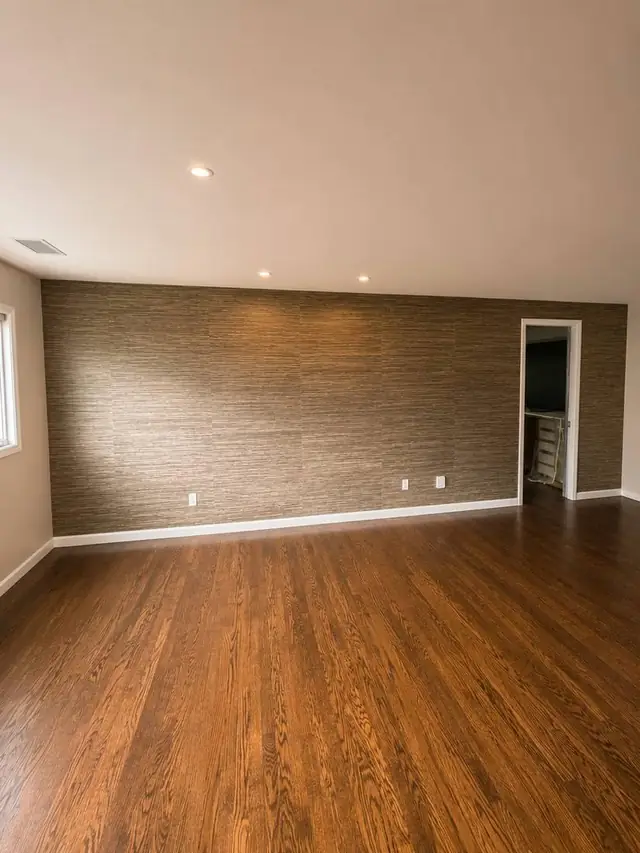 Textured grasscloth wallpaper on a feature accent wall, Vancouver