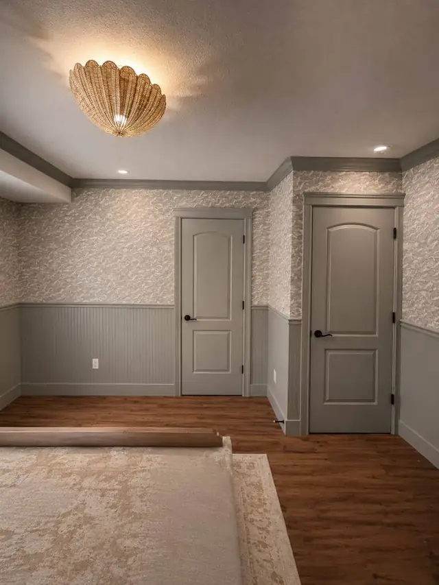 Textured neutral wallpaper with beadboard wainscoting in a kids' room, Portland