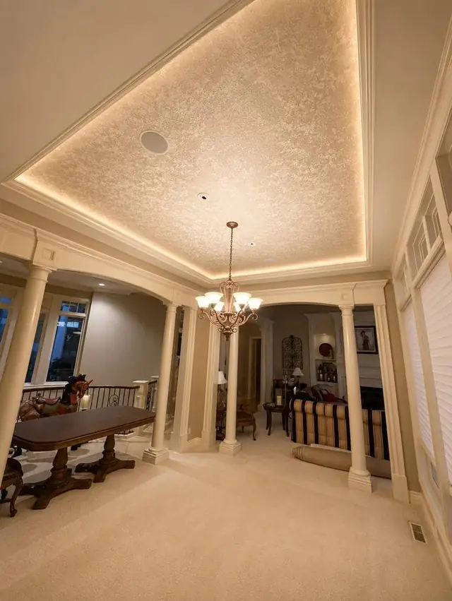 Textured metallic wallpaper on a lit tray ceiling with columns, Portland