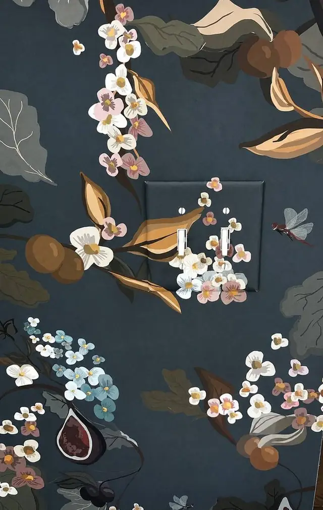 Dark floral wallpaper papered over a light switch plate, Vancouver